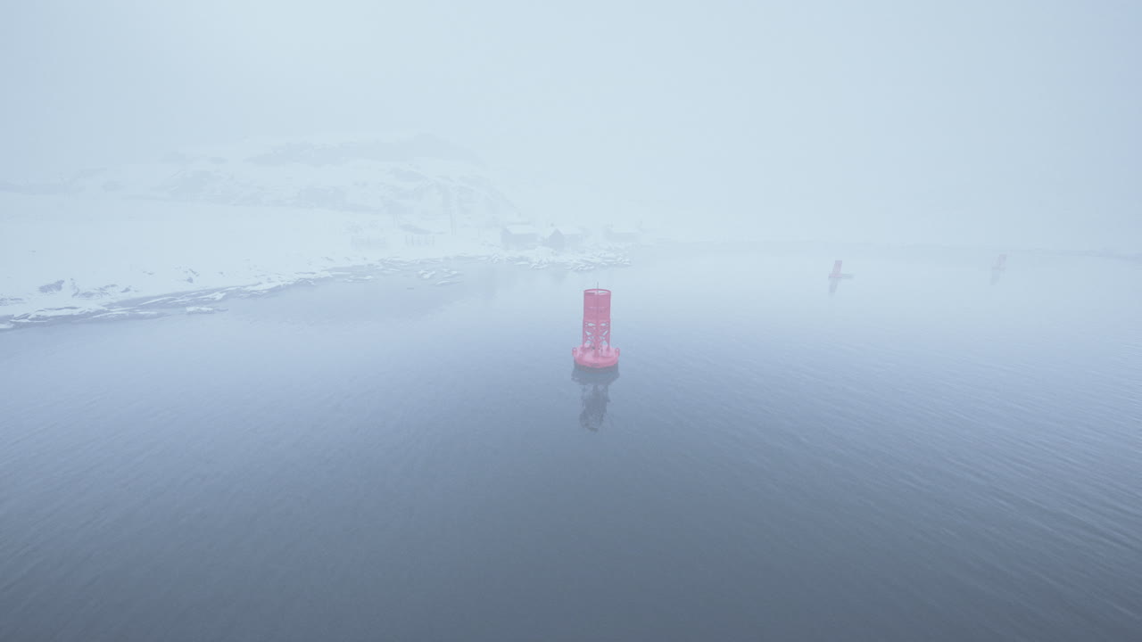 Foggy Winter Landscape with Buoys