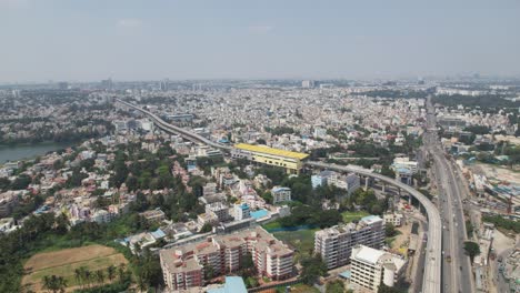 Aerial-video-showing-heavy-traffic-at-Bangalore,-India's-Central-Silk-Board-intersection