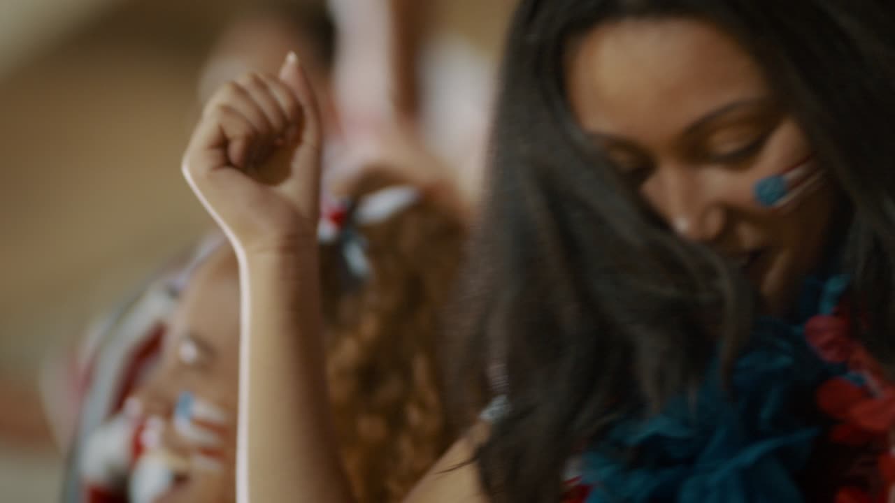 미국 스포츠 팬들이 팀을 응원하고 있습니다.