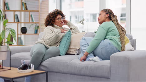 Friends,-women-and-talking-on-sofa