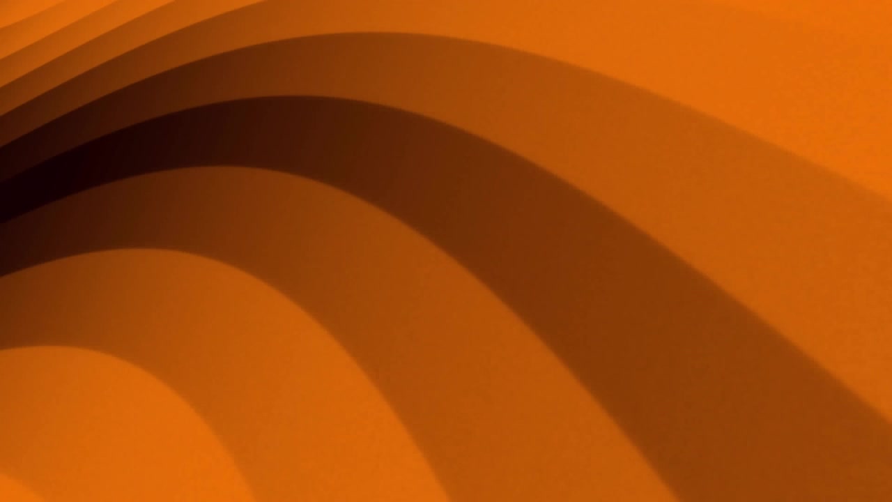 Animation of orange shapes moving on black background