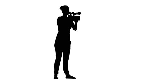 woman filming with a video camera