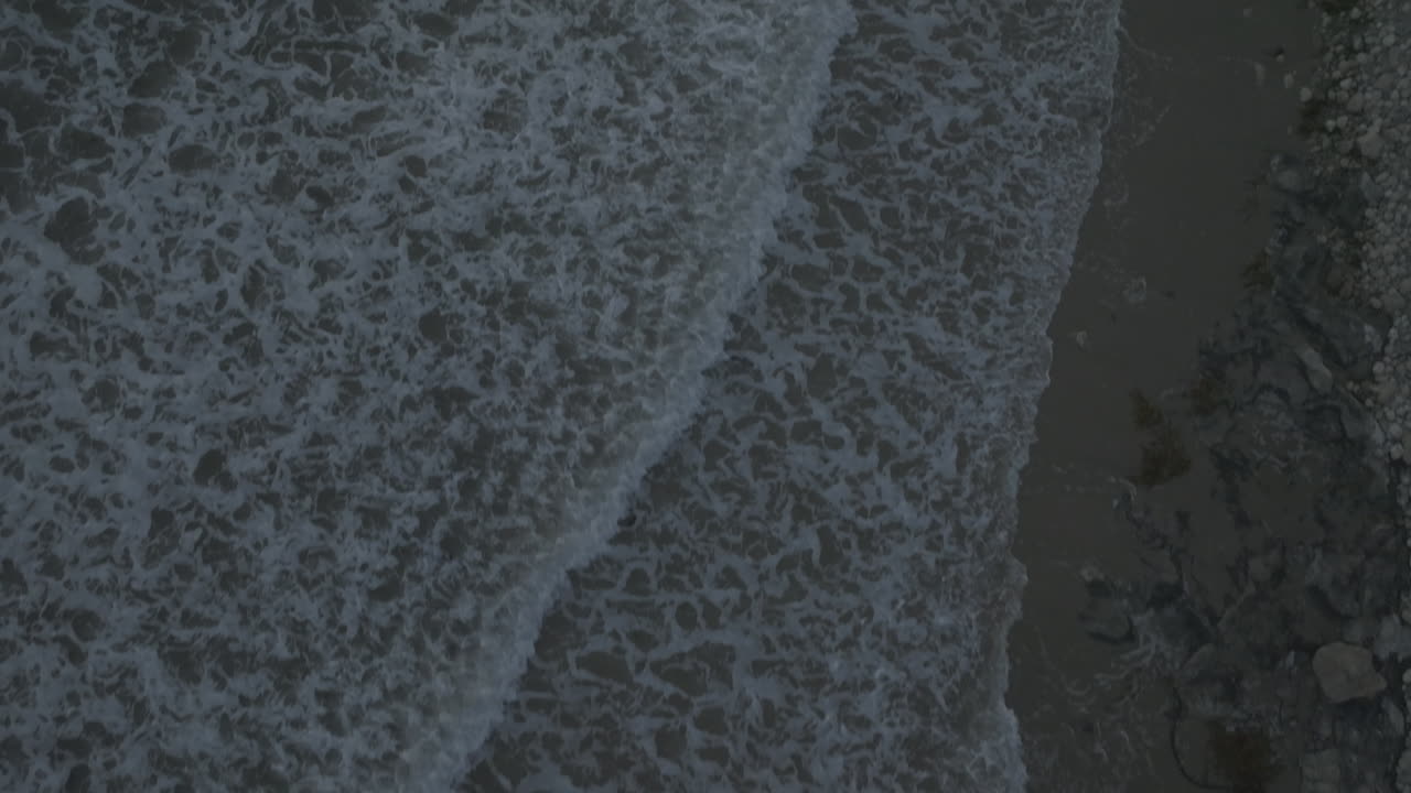 Incredible aerial view of giant ocean featuring lavish rocky mountain