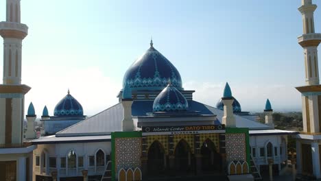 aerial of the islamic center dato tiro bulukumba mosque and school for islamic education in south sulawesi, indonesia