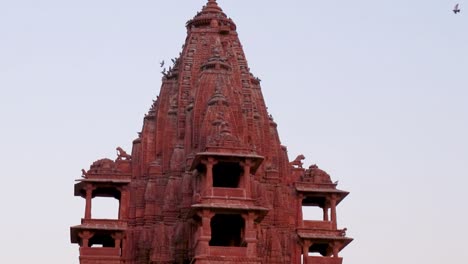 red stone ancient hindu temple architecture from unique angle at day