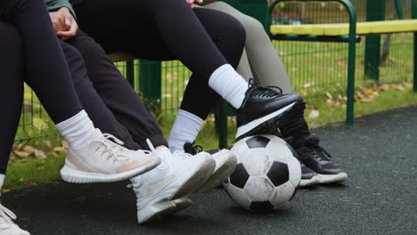 friends in an outdoors soccer field