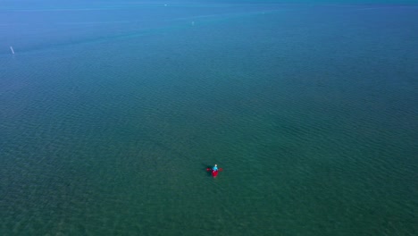 a bright red kayak off the florida keys