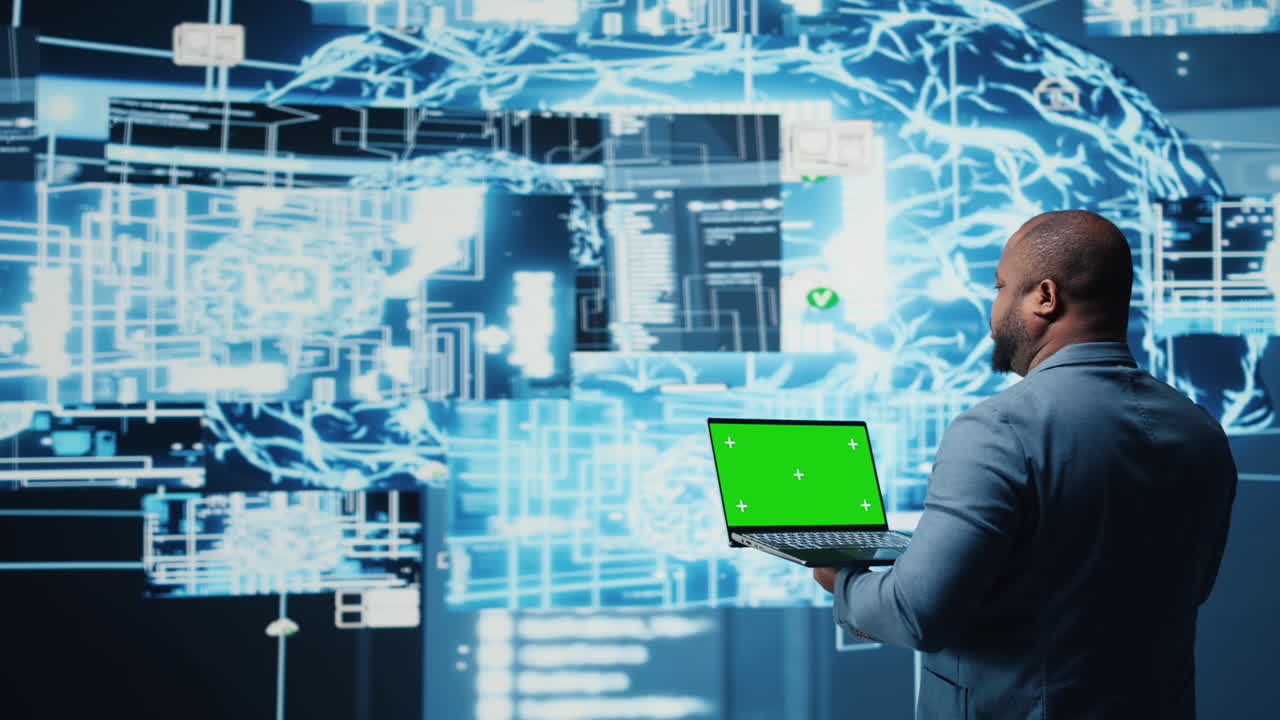 Black high tech engineer holding phone with isolated mockup screen