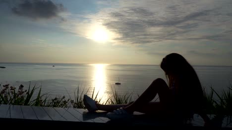 little girl greet the sunset on the sea, italy,lookout, calabria , summer,tropea