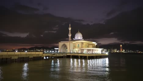 masjid terapung butterworth with komtar as background