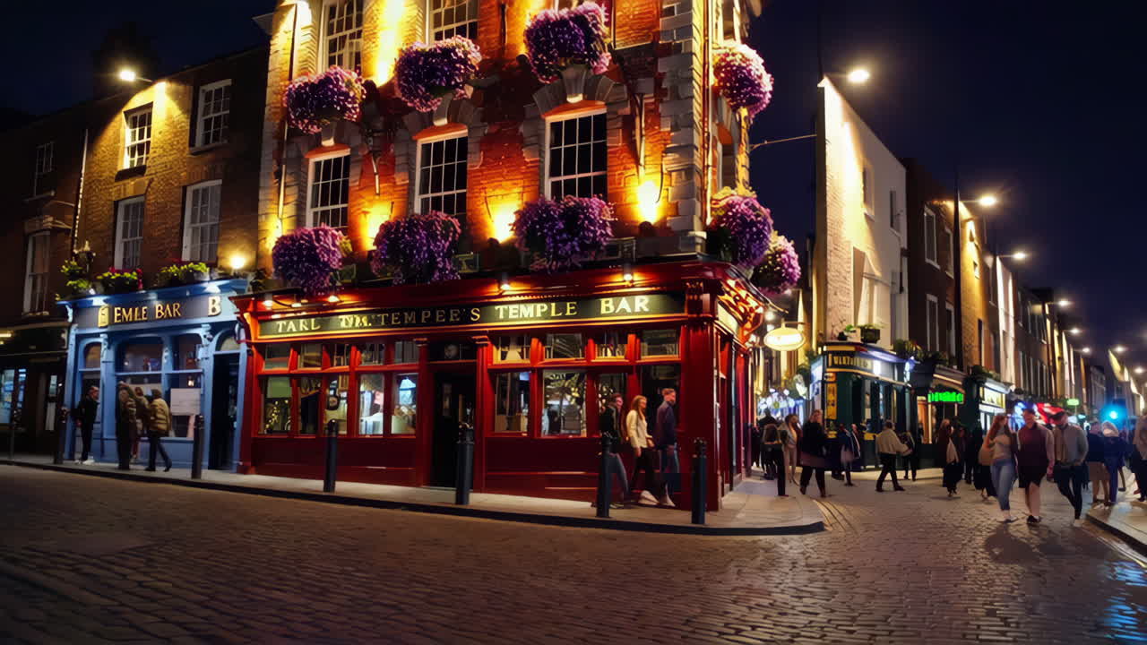 Evening Scene at The Temple Bar in Dublin with People on the Cobbled Street