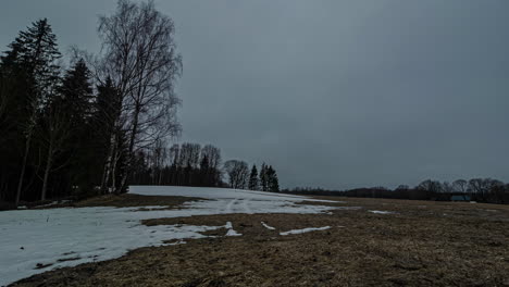 Stormy-weather-and-a-dark-overcast-sky-in-an-all-day-time-lapse-that-ends-with-the-sunset