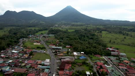 La-Fortuna-Town-of-Costa-Rica-with-Arenal-Volcano---aerial