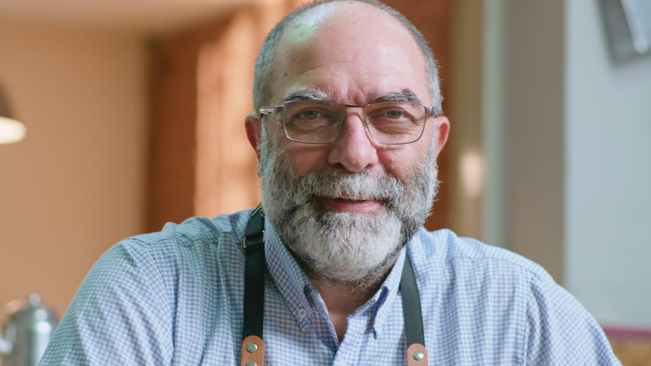 Portrait of a man with glasses and beard
