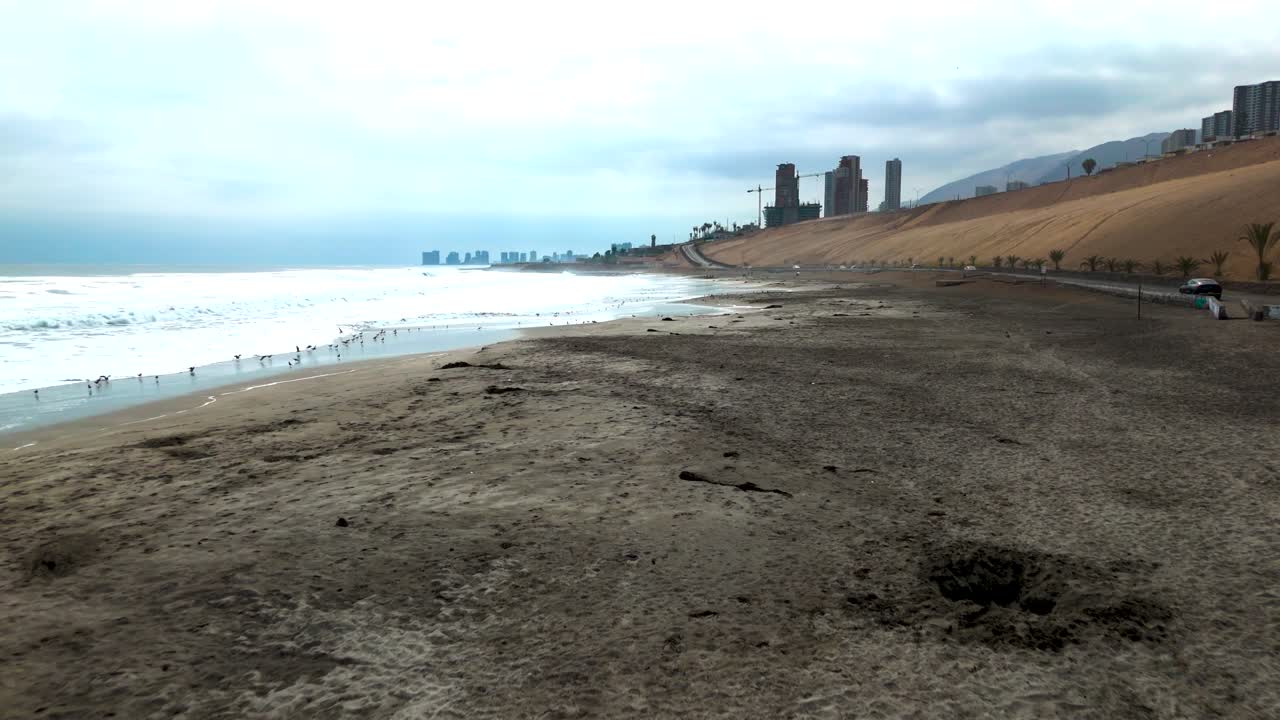 Huayquique beach Chile Iquique building ocean sea traffic tarapaca mountain drone travelling