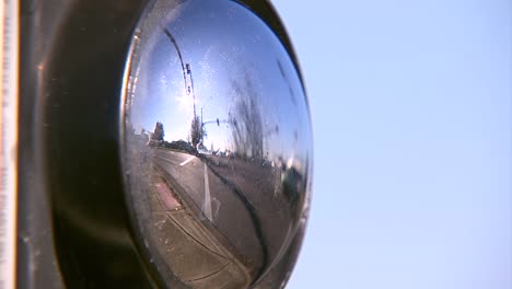 walk button reflection on intersection