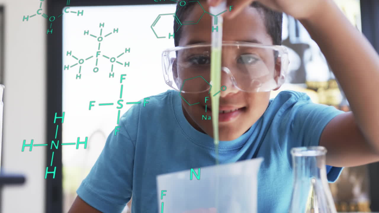 Conducting science experiment, child with safety goggles over chemical formulas