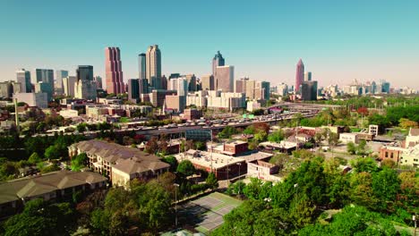 descending aerial view of the cityscape of atlanta , georgia