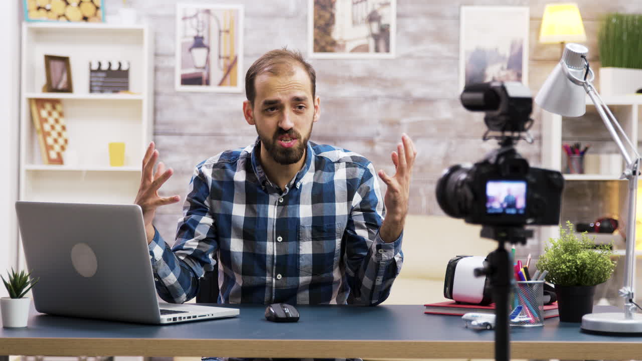 Man recording a vlog at home