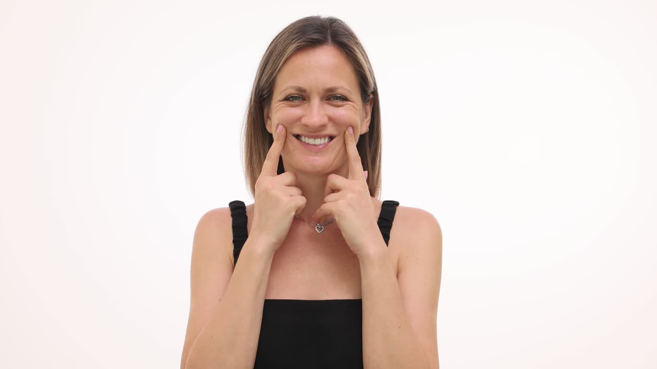 Portrait of a smiling woman with dimples