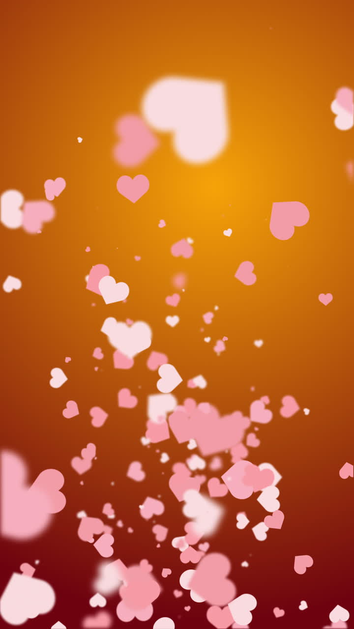 Flying romantic red hearts of different sizes. Animated abstract orange background. Looped video. Concept for valentine's day, wedding. Vertical video.