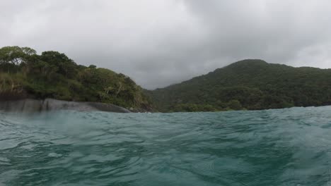 POV-shot-of-Con-Dao-island-in-Vietnam,-captured-using-a-GoPro-from-a-water-surface