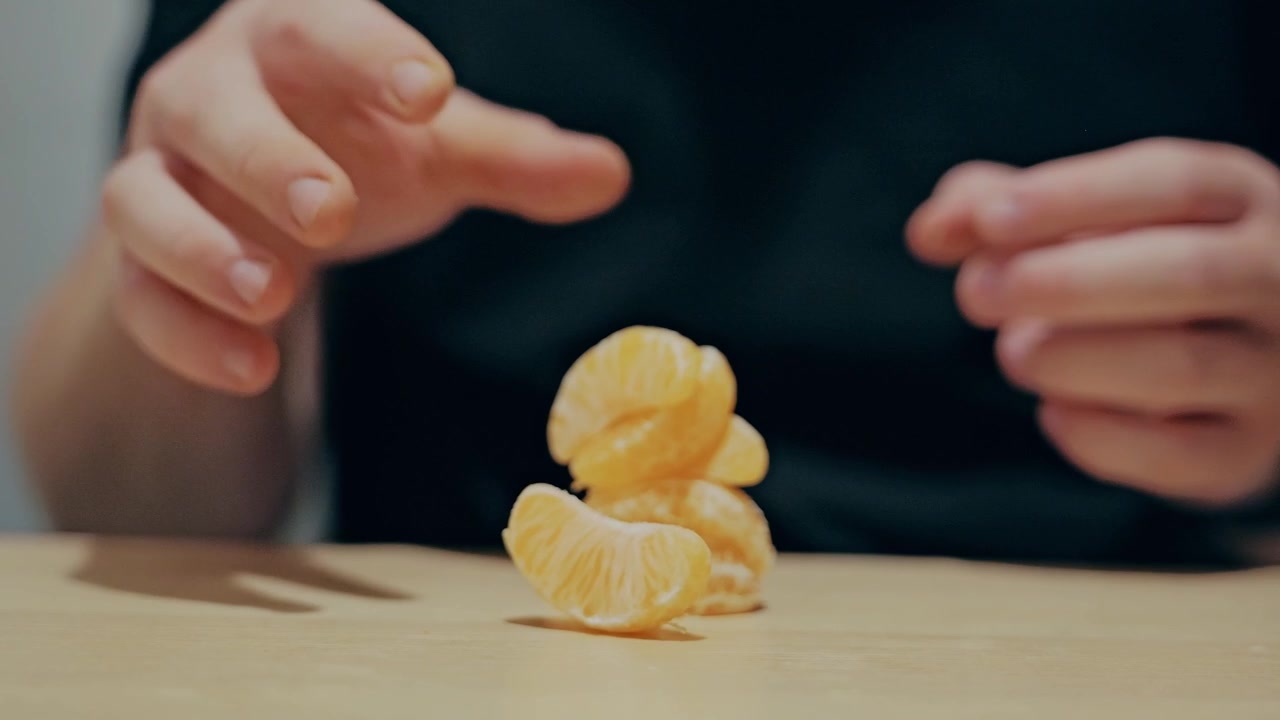 Taking Mandarin Segments by Hand, Healthy Eating and Portion Choice