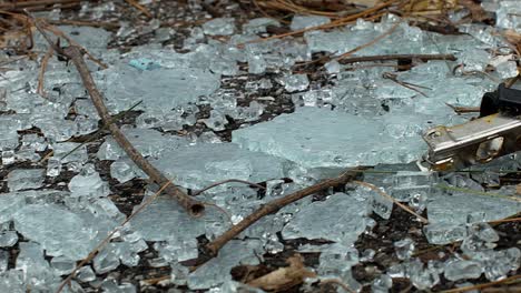 Slide-over-broken-safety-glass-from-an-automobile-or-car-in-a-parking-lot