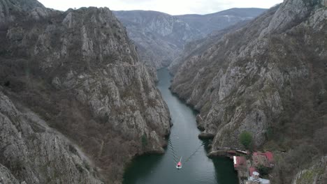 View-of-beautiful-tourist-attraction,-boat-on-the-lake-at-Matka-Canyon-in-the-Skopje-surroundings-Macedonia