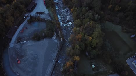 aerial flying over river in courmayeur, aosta valley, italy, alps