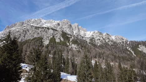 Gorgeous-Alpine-mountain-range-with-snowy-peaks,-a-popular-hiking-destination-visible-from-Nassfeld-during-winter-in-Austria