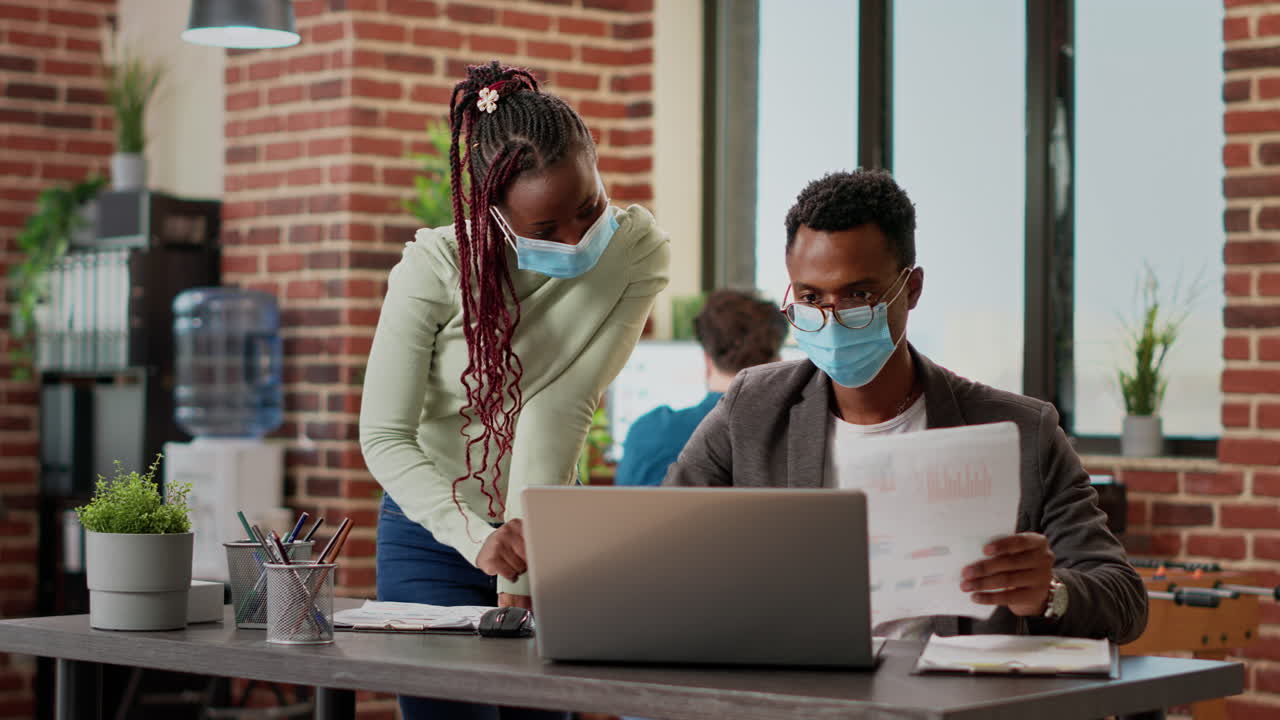African american people doing teamwork to analyze business information