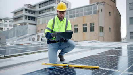 construction worker inspecting solar panels on a rooftop