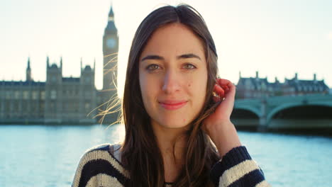 a beautiful young woman smiling while on holiday