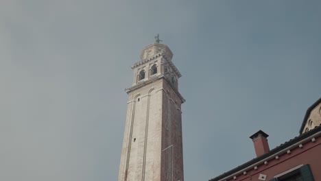 tower of san giorgio dei greci view from venice canal, italy