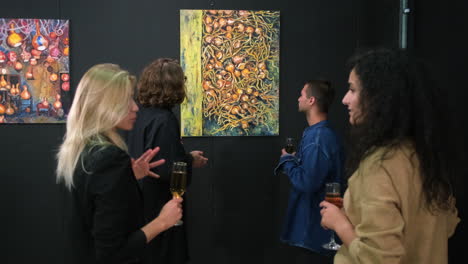 art exhibition with guests viewing an onion painting