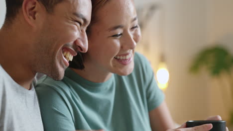 Happy,-coffee-and-laughing-asian-couple-bonding