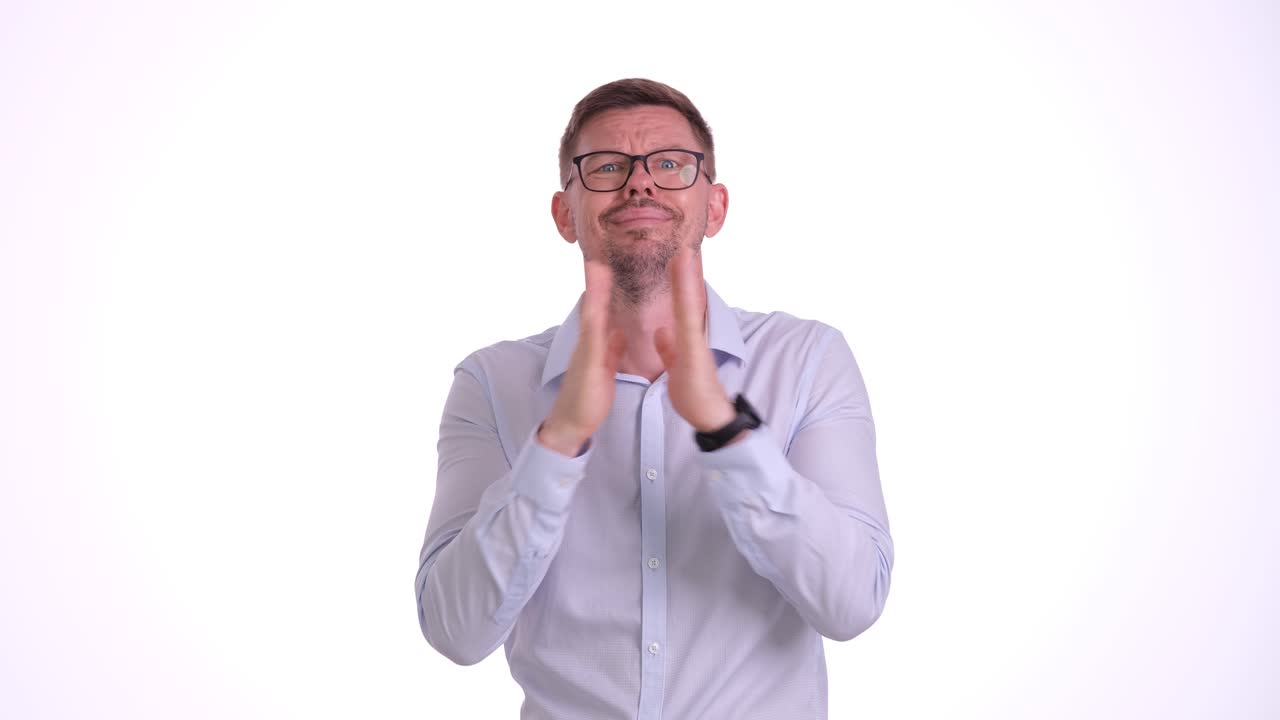 Man Expressing Hope and Wishes with Gestures