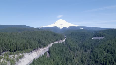 high drone shot offers a slow pan, tracking the majestic mount bachelor