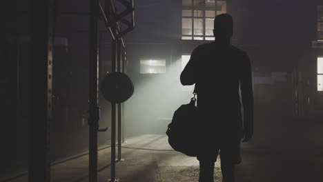 Man Leaving the Gym at Night