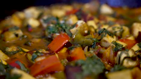 Close-Up-View-Of-Tasty-Spice-Paneer-Curry-Dish-With-Red-And-Green-Peppers-In-Pan