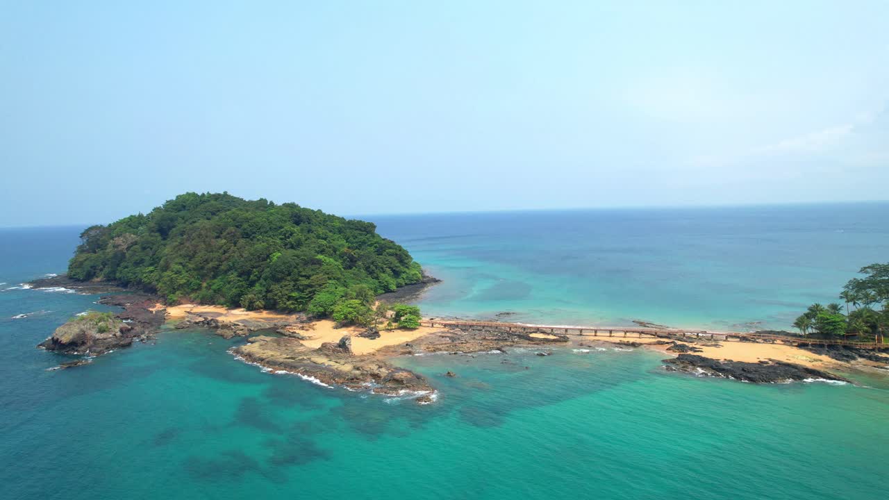 Circula aerial view from Bom Bom beach with the walkway that connects the beach at bom bom islet at Ilha do Principe, São Tomé,Africa