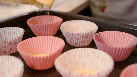 cake cases on a baking tray