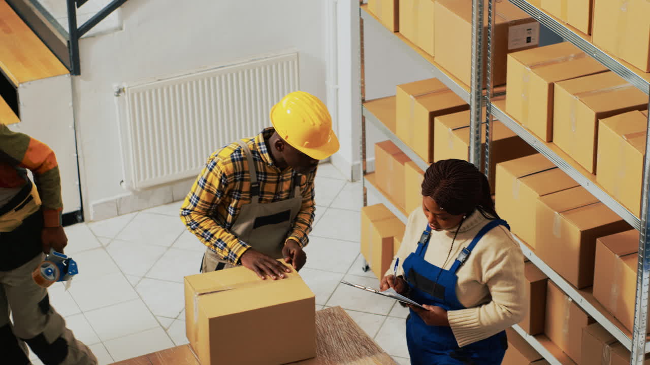 Warehouse workers handling boxes