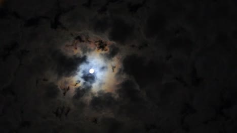 moon peeking through clouds