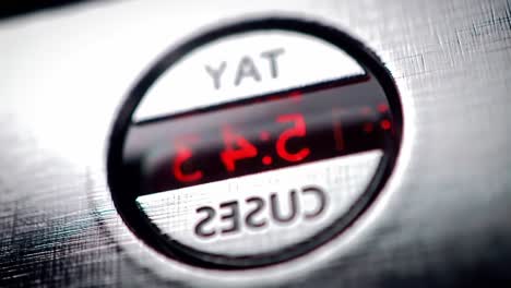 close-up of digital display panel showcase with changing numbers indicating time or measurement adjustments for an electronic device