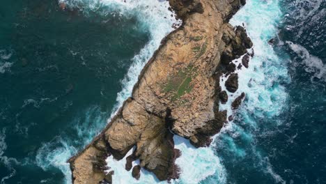 approach the cliffs: capturing the grandeur of punta cometa's cliff