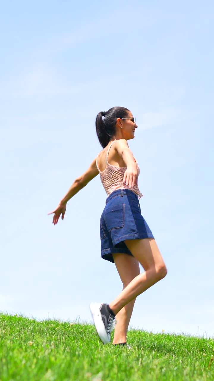 Woman Posing on Grass Field