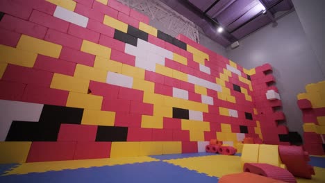 colorful indoor playground with large building blocks