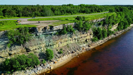 Turisalu-Cliff,-rocky-coastline-at-the-Baltic-Sea-coast,-aerial-Estonia-nature